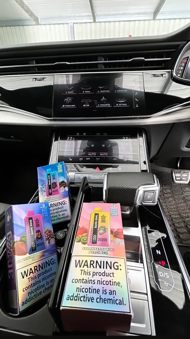 Boxed Bang King units with holographic warning labels